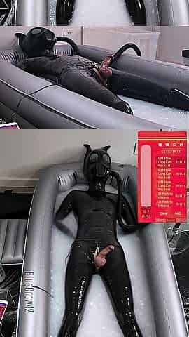 Electro stimulation milking training of a latex puppy wet in jizz pool