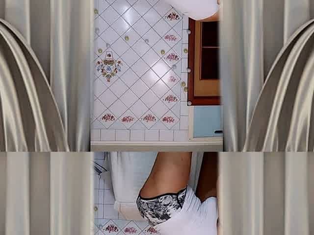 Hot Housewife Lukerya Flirts in Home Clothes and Entices with Her Bare Feet