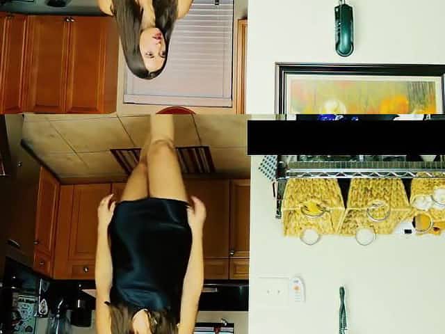 Chubby milf was wearing black, satin dress while she was getting fucked in the kitchen