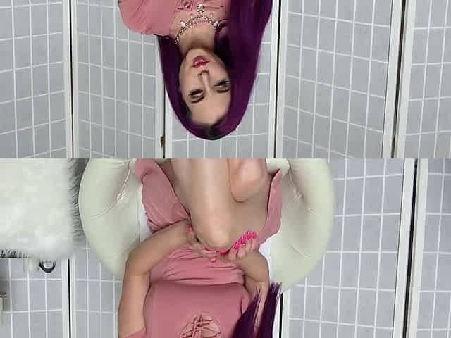 Busty babe playing with her big boobs