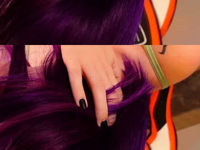 Redheaded pierced teen close up toy show