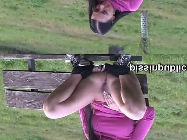 Peeing sweethearts empty their bladders in a park being part of voyeur pee movie