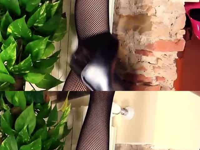 Tessa dressed in fishnet bodystocking