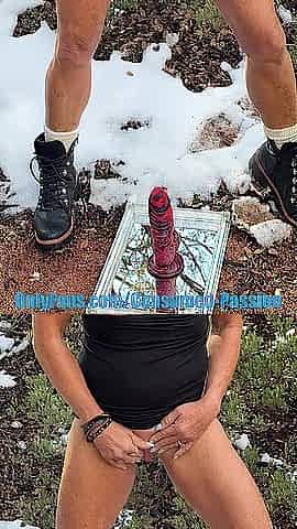 Riding and squirting on a thick ebony sex-toy getting impure and creamy along a snowy trail.