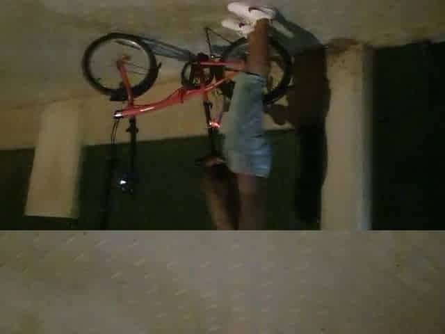 Hot chap disrobes on a public street and rides a bike nude touching his weenie - risky