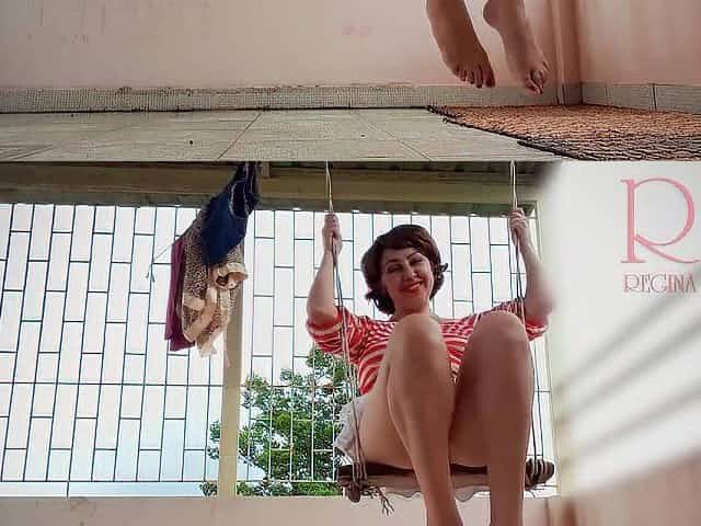 Cute housewife has joy out of pants on the swing Doxy swings and shows her consummate vagina 1