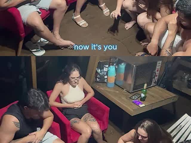 2 couples playing truth or dare.