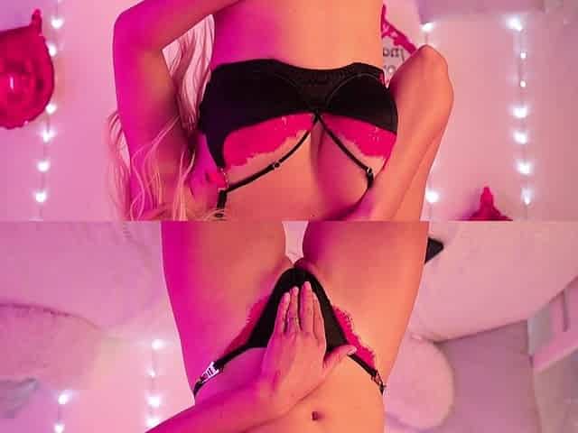 A Beauty in Romantic Lingerie Puts Her Hand Into Her Panties