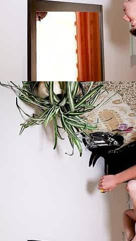 Val Applies Makeup Naked in Front of the Mirror.
