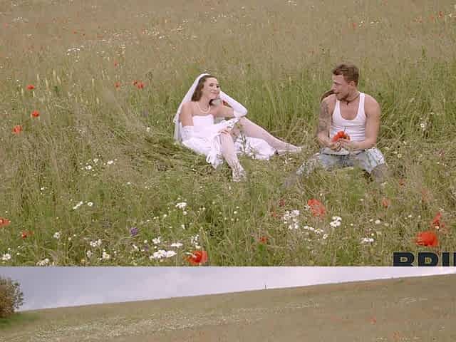 A bride in white satin lingerie has sex with her husband outdoors