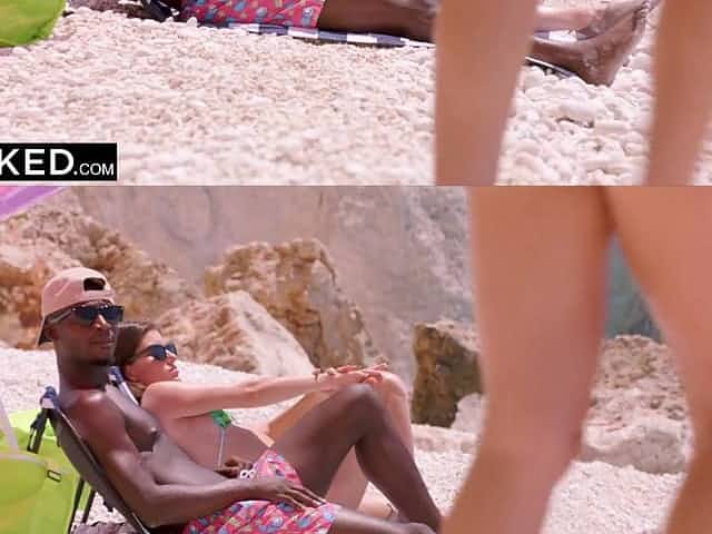 Blonde in extreme swimsuit sucks fruit ice and seduces men on the beach!
