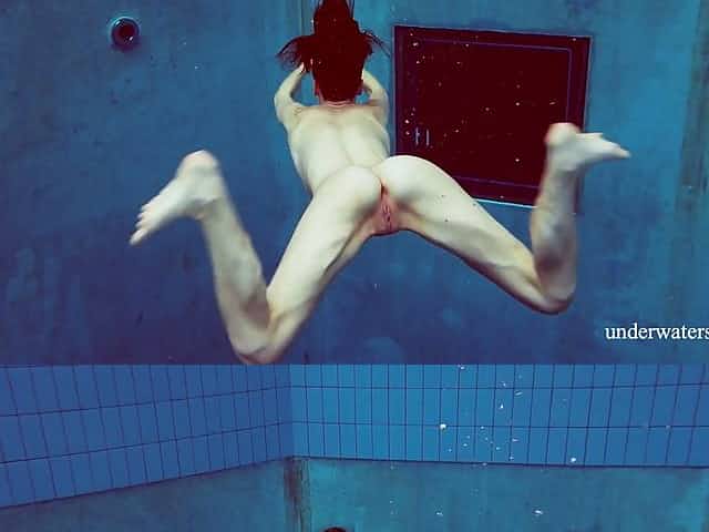 Sexy swimmer Martina takes off her bikini under the water