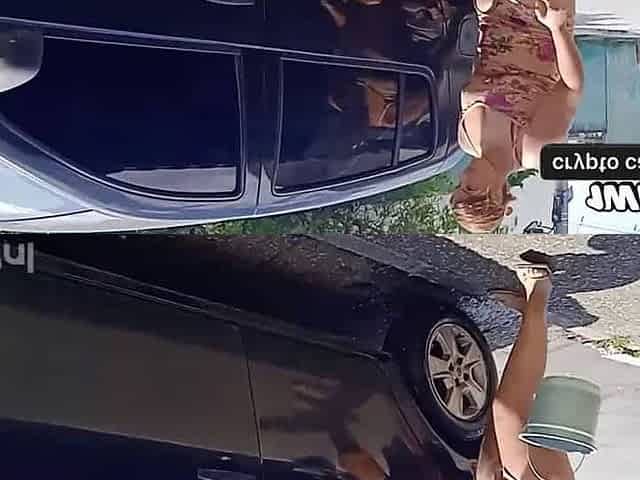 HOT GIRL WASHES HER CAR SHOWING OFF ON THE STREET