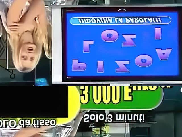 Smoking hot Italian blonde teases with her tits live on TV
