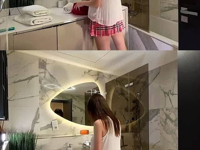 Lengthy legs nerdy college cutie with a short pink petticoat and pink pants show off in the bath