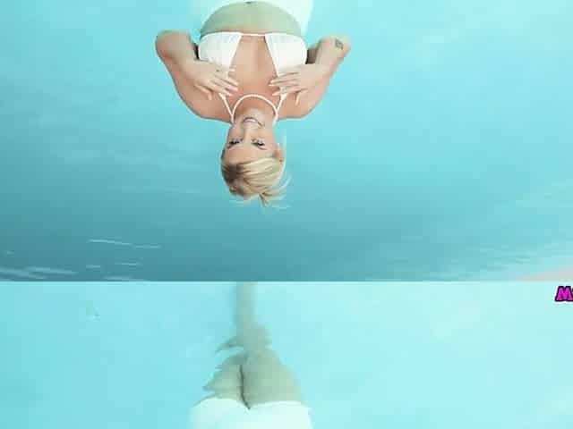 Voluptuous Irich Essie Flashed Her Large Tits Whilst In The Pool