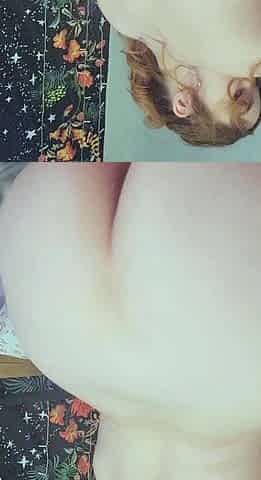 Amateur redhead Jacqueline with glasses masturbates