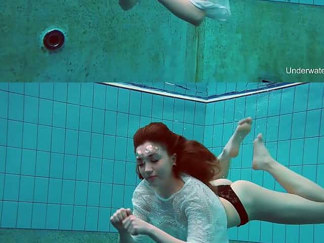 Nice chick Katrin Bulbul swims and flashes her pierced hard nipples