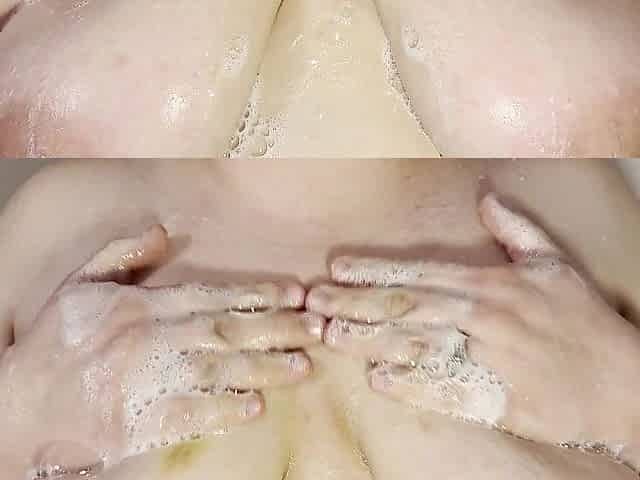 Soaping up my big tits slippery when moist!