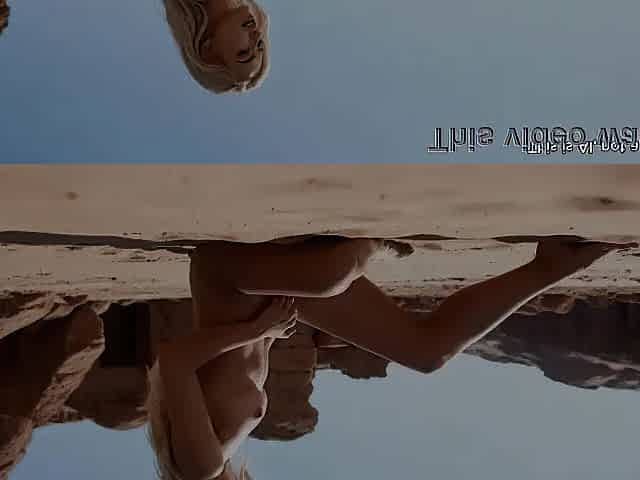 Sexy golden-haired having sex in the desert - AI generated
