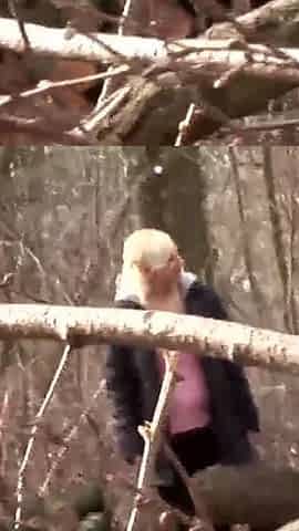 Mature blonde woman in fishnet fucked on the log