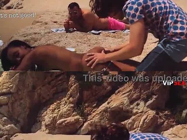 Oiled Up Black Chick Gets Her Boobs and Booty Rubbed on a Public Beach