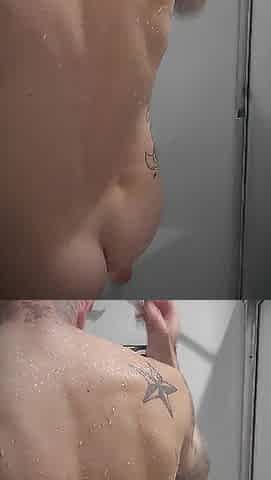Tattooed man with a large jock screws a Tenga egg in the shower