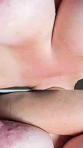 Rubbing Oil on My Huge Tits