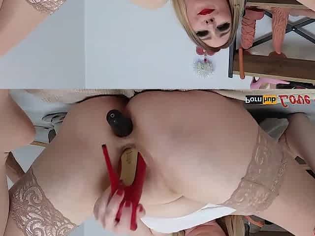 Heels in twat and urinate inside. Hardcore DP with a bottle and heels.