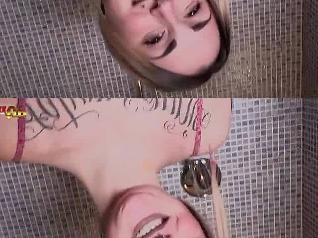 Tattooed Medusa blond masturbating in the bath