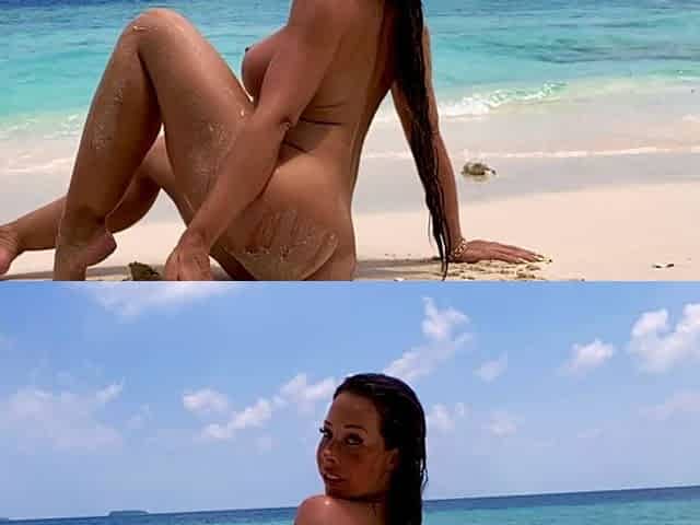 Brunette babe erotica herself on beach