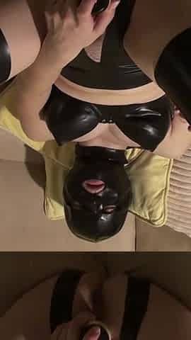 Latex Danielle playing with dildo