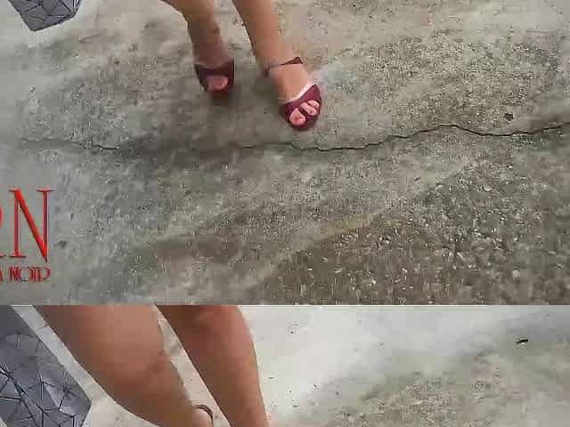 A lady masturbates in a car in a parking lot Teasing a love button with a vibrator