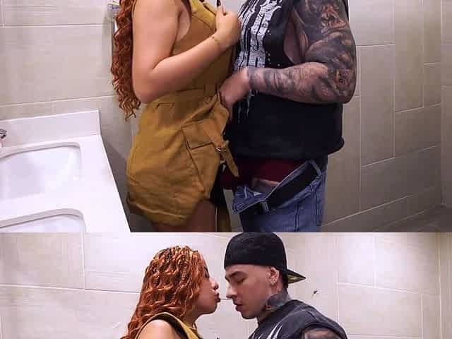 Busty redhead accidentally walks into the men's bathroom
