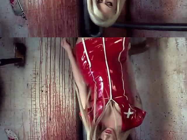 A blonde doll likes solo masturbation in red
