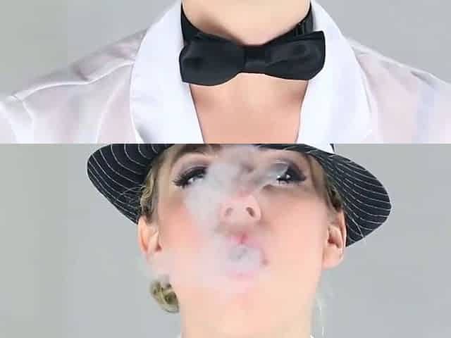 Smoking ash-blonde honey in a white shirt and bow tie