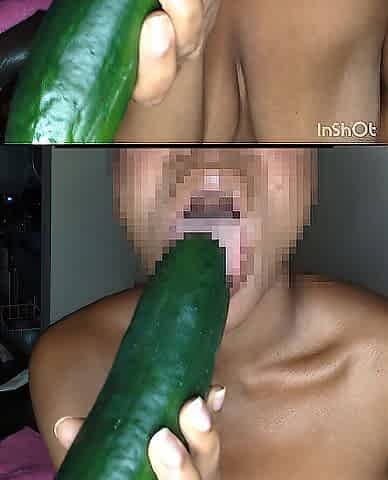 Youthful Black masturbates with a cucumber