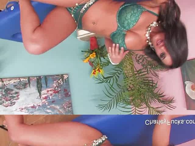Breasty pornstar Charley masturbates on the massage table