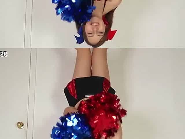Excited Brunette Hair Cheerleader Performs