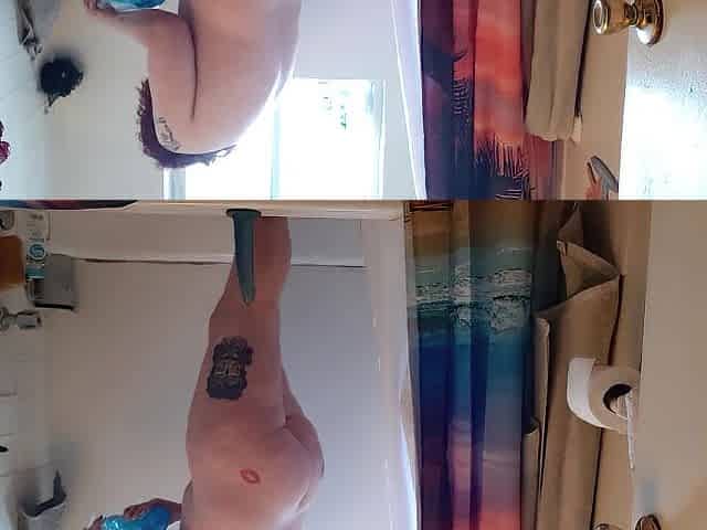 Pawg plays with slippery sex tool in the bathtub