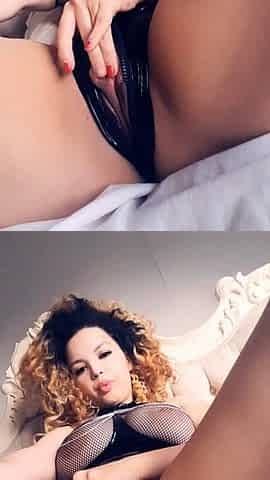Busty babe playing with her big boobs