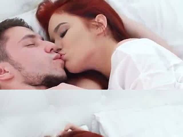 Sexy young redhead takes selfies in city lights