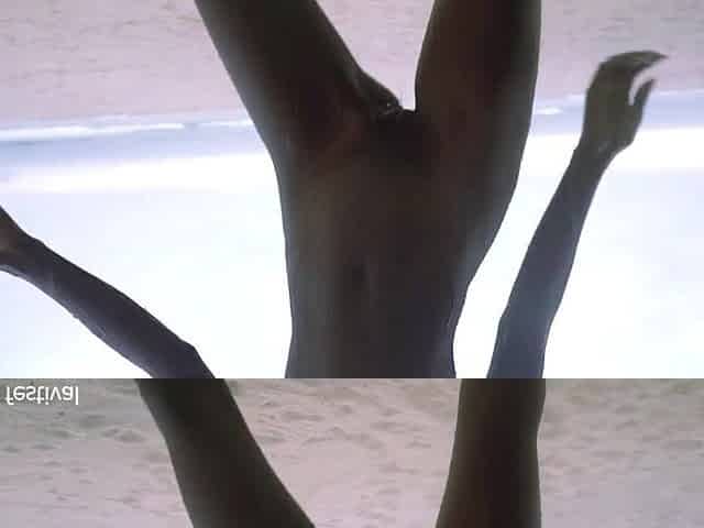 Slender black village angel dancing stripped in the rain with her consummate skinny body