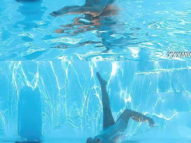 Underwater swimming with the majority nice-looking model