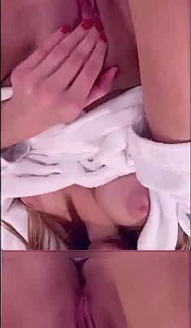 Showing teats and masturbating