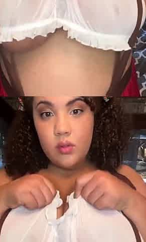 Busty babe playing with her big boobs