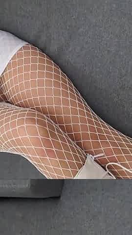 Perfect-assed MILF in High-heeled Boots and Fishnet Stockings