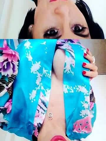 Busty curly brunette with big boobs fucks on couch