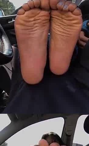 Lustful black feet in lap tease