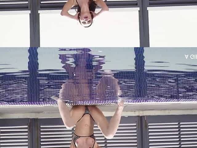 Fiery brunette enjoys sensual outdoor pool masturbation big tits